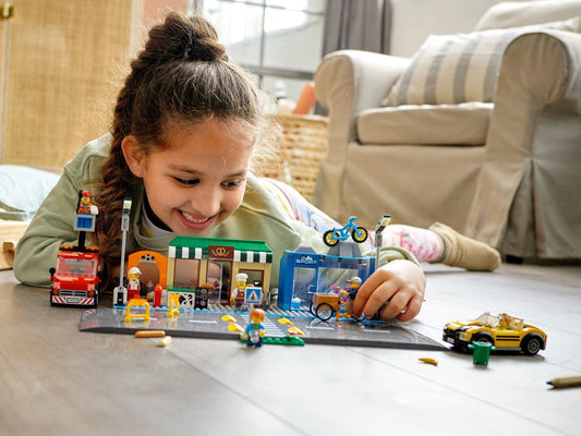 LEGO 60306 City Shopping Street: Bakery, Bike Shop & Fun Park – view 2 - Auzzistore