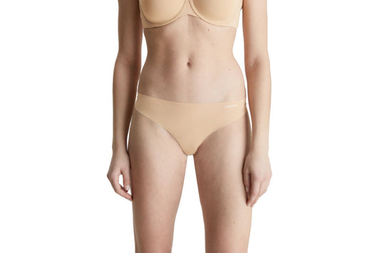 Calvin Klein Women's Invisibles Thong (Light Caramel, Size XS)