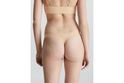 Calvin Klein Women's Invisibles Thong (Light Caramel, Size XS)